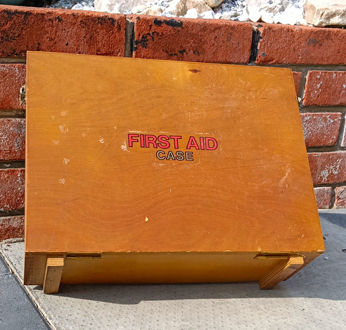 Wooden first aid - case, wall